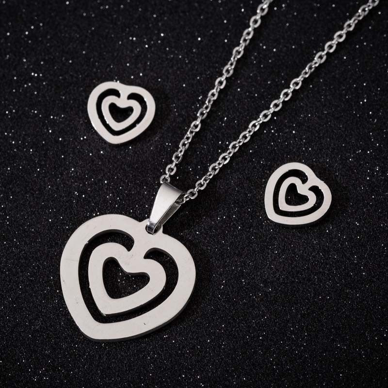 Peach heart gesture than heart necklace