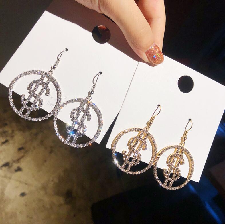 Dollar sign earrings