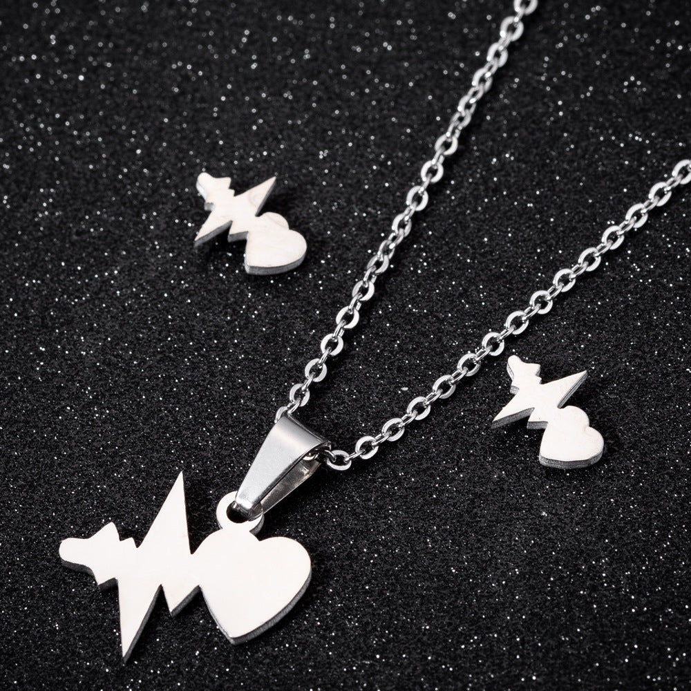 Peach heart gesture than heart necklace