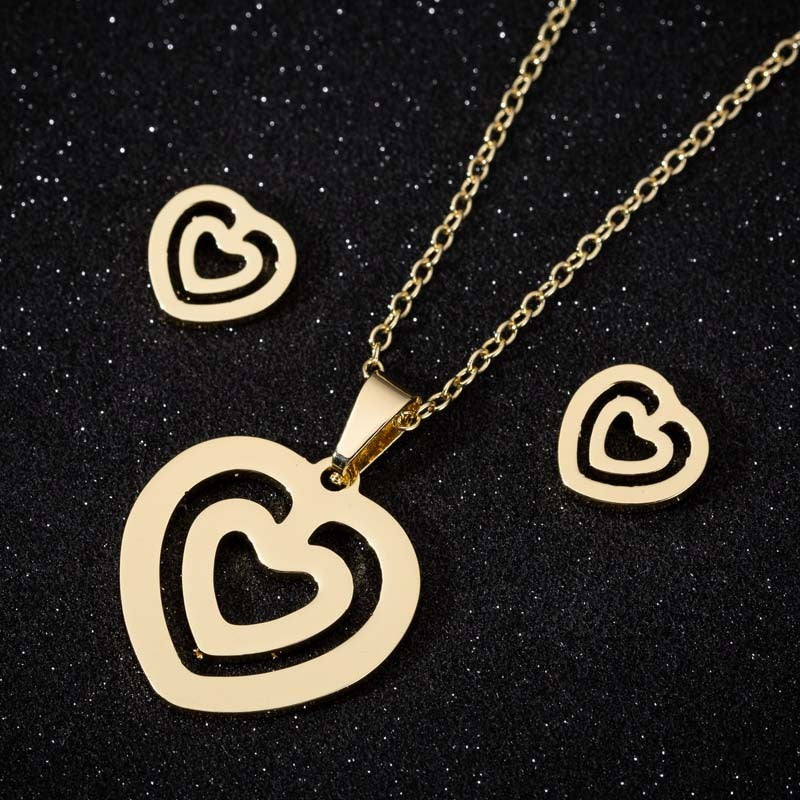 Peach heart gesture than heart necklace