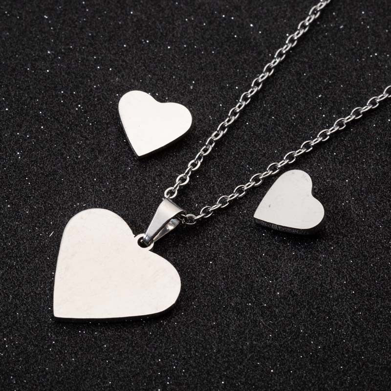 Peach heart gesture than heart necklace