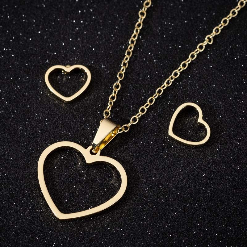 Peach heart gesture than heart necklace